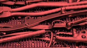 A bunch of different types of tools are stacked together.