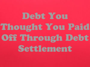 A red background with the words debt you thought you paid off through debt settlement