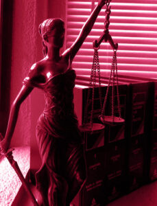 A statue of lady justice holding the scales.